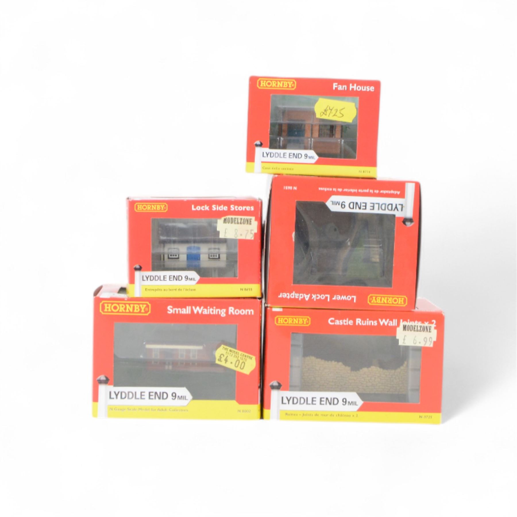 Thirty Hornby N gauge Lyddle End model railway trackside buildings, including N8031 Holy Trinity Church, N8575 Coal Drop, N8033 Radcliffe's Newsagent and N8002 Small Waiting Room, all boxed