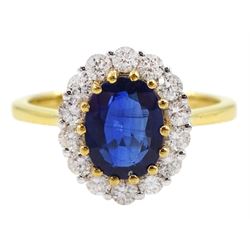18ct gold oval kyanite and round brilliant cut diamond cluster ring, stamped 18K, kyanite 1.68 carat, with World Gemological Institute report 