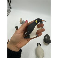 Group of eleven Scottish 'Isle of Arran' bisque porcelain birds, to include Great Northern Diver, Eider, great Crested Greebe, Artic Tern, King Penguin, etc.
