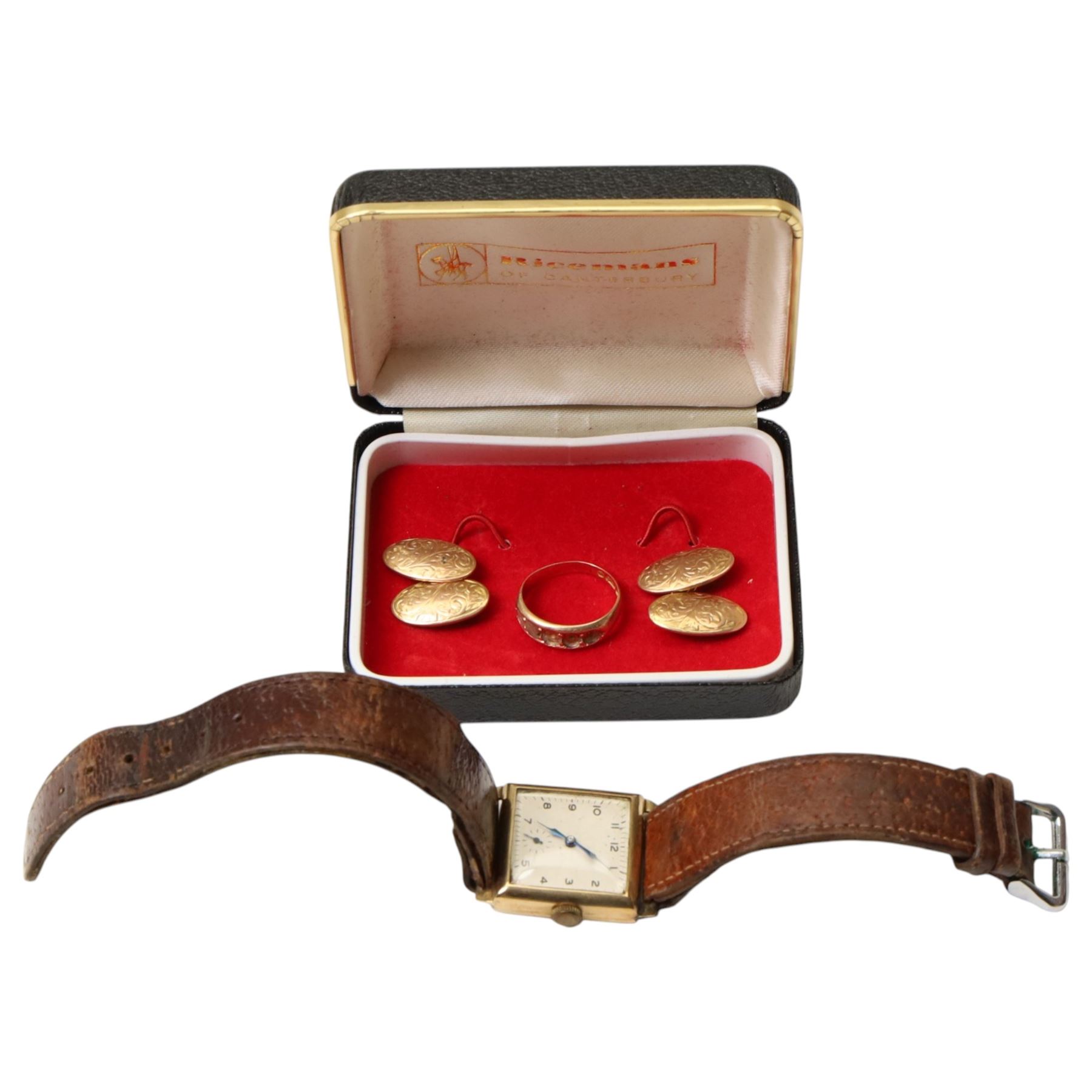 Pair of rose gold cufflinks with engraved decoration and gold wristwatch on leather strap, both 9ct and a 15ct gold ring