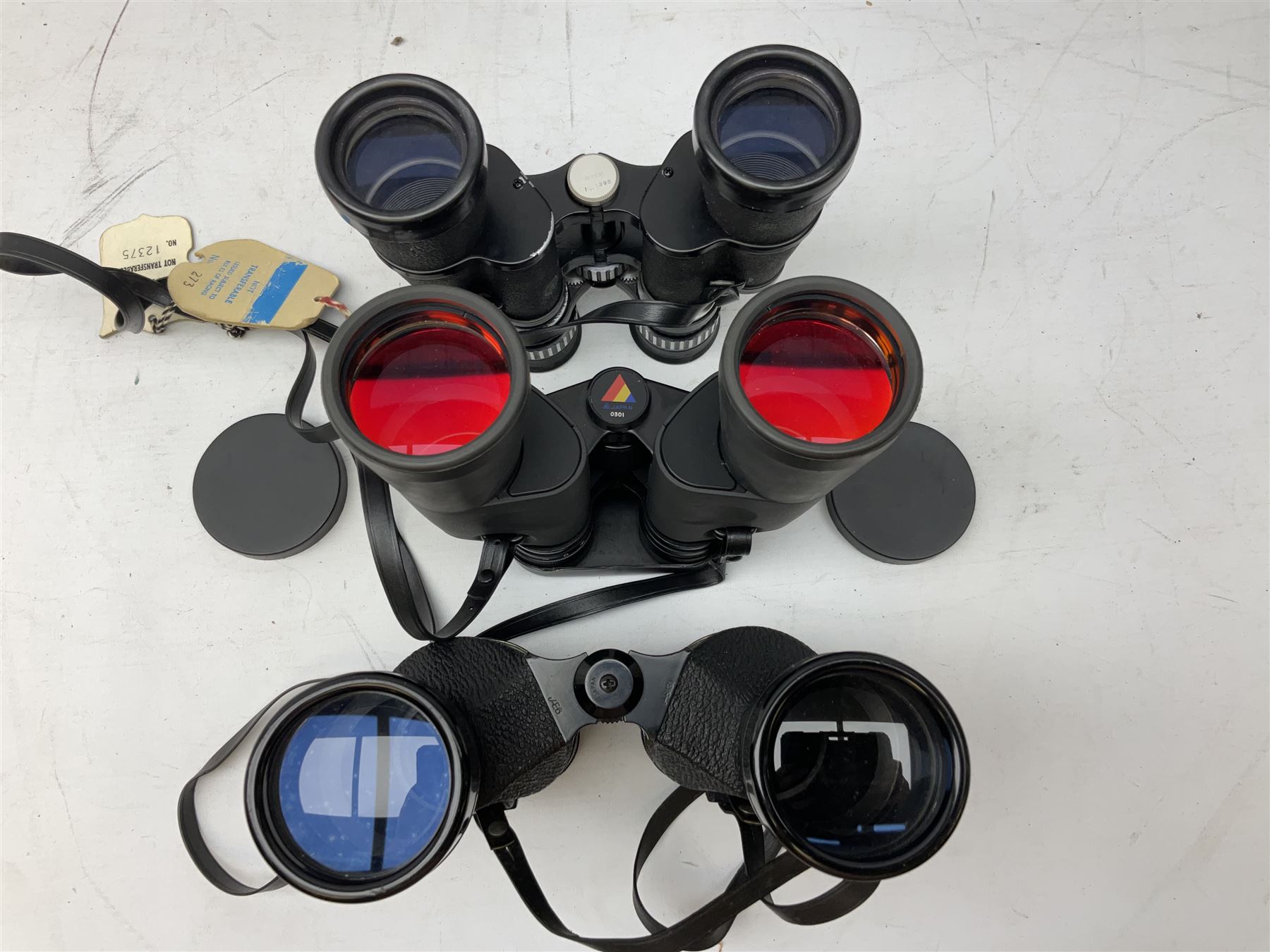 Eleven cased pairs of binoculars to include Summit 8x30,  Concord 8x40, Tasco no. 106 8x - 16x40, Chinon 10x50, Tokina 7x42 Field, Zoom 6x- 12x32 etc