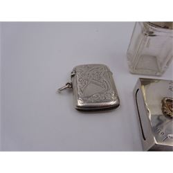 Group of silver, comprising Edwardian silver matchbox cover, with applied decoration and personal engraving, hallmarked Chester 1905, two vesta cases and a glass scent bottle with silver screw cap, all hallmarked 