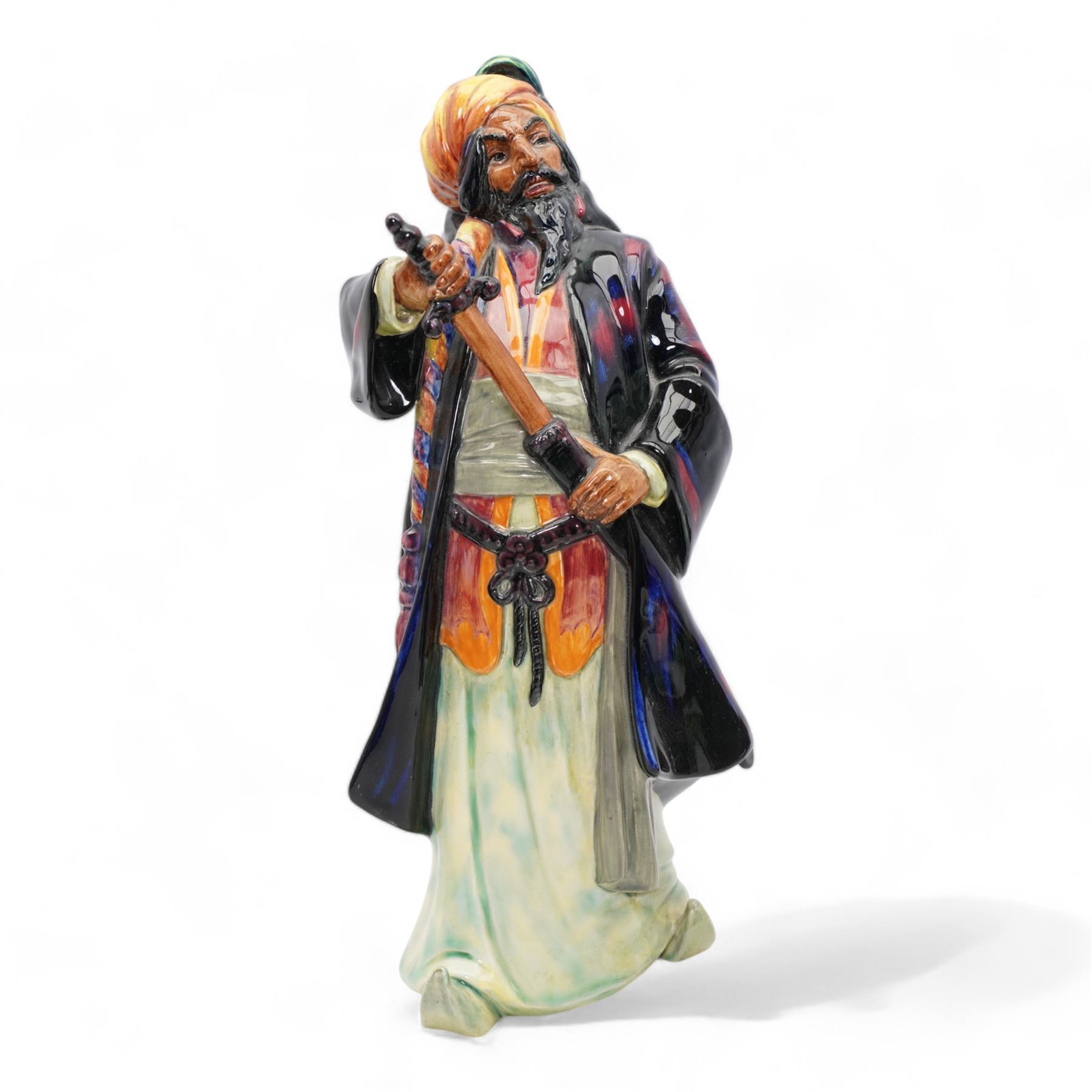 Three Royal Doulton figures comprising 'Sairey Gamp' HN1896, 'The Jester' HN2016 and  'Blue Beard' HN2105 (3)