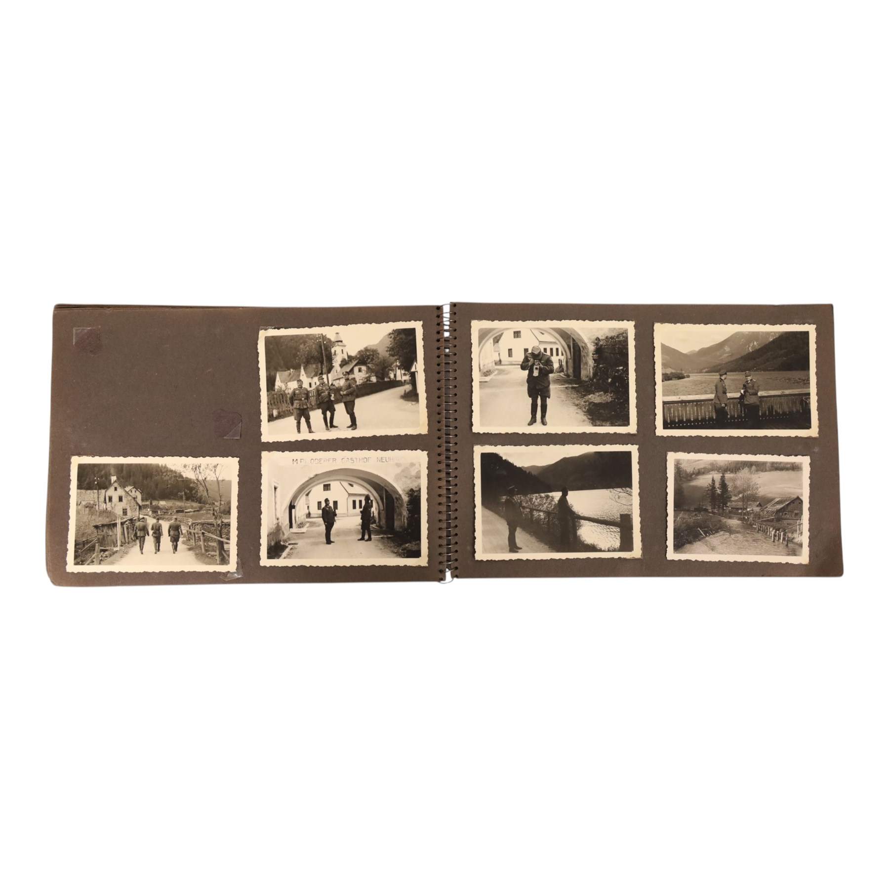WWII German Soldiers photo album, 1942, including photographs of soldiers in uniform posing during parade etc  