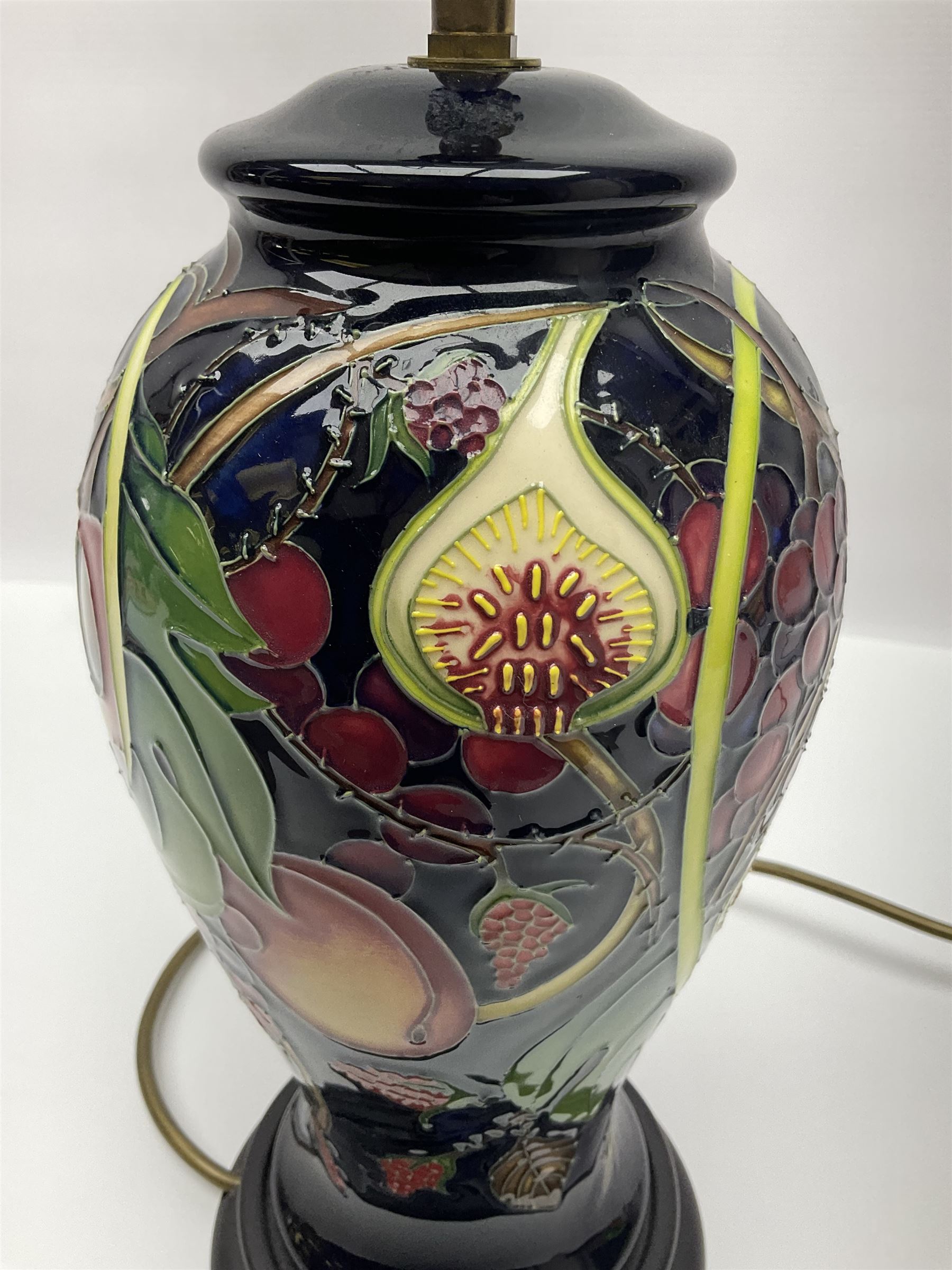 Moorcroft table lamp of baluster form, decorated in the Queens Choice pattern by Emma Bossons, H49cm