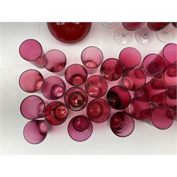 Victorian and later cranberry glass, comprising eight wine glasses, thirty two tumblers and a decanter