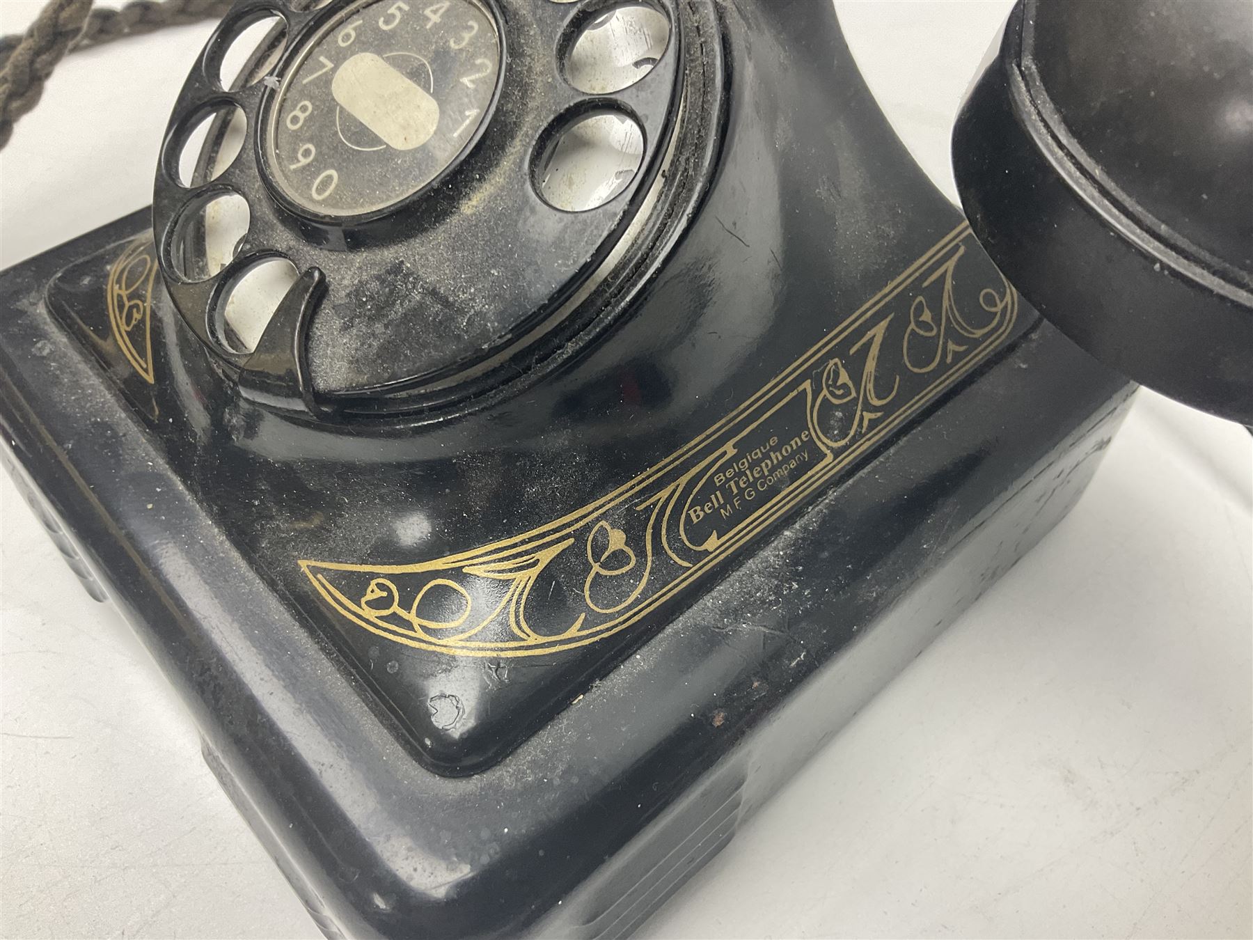 Belgique Bell Telephone by MFG Company with rotary dial and gilt decoration