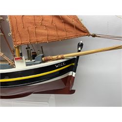 Wooden model of the Peterhead Herring Fishing Boat, Love Divine, PD404. on stand together with Wick Herring Fishing Boat, Galilee WK.1. on stand, L105cm, H64cm