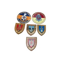 Collection of military shields and cast iron signs, including Royal Wessex Yeomanry, Royal Sussex Regiment etc 