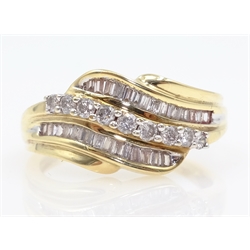  Baguette and brilliant cut diamond gold swirl ring hallmarked 9ct   