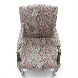 Chippendale design Gainsborough elbow chair, upholstered in kilim fabric, blind fretwork and acanthus carving