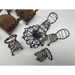 Quantity of early 20th century doll's house furniture comprising Victorian style beadwork and upholstered eight-piece salon suite; beadwork dining table with four matching chairs; and Kleeware brown plastic seven-piece dining suite