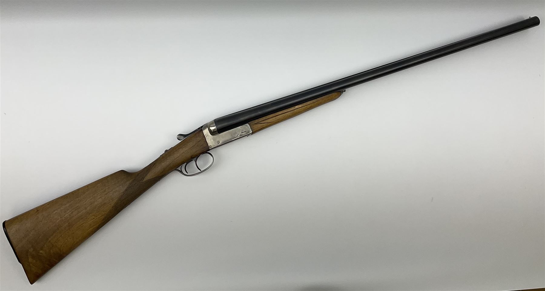 Spanish Master 12-bore side-by-side double barrel boxlock ejector sporting gun, 70.5cm barrels, pale walnut stock with chequered grip and plain fore-end and thumb safety, serial no.130828, L113cm SHOTGUN CERTIFICATE REQUIRED