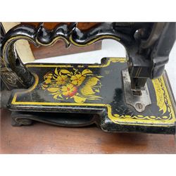 James G Weir 'The Globe' hand-cranked sewing machine, circa 1872, in black finish with gilt and flower painted decoration, the bed stamped Ja's G. Weir, 2 Carlisle Street, Soho Sq., London, with walnut locking carrying case and original manual, boxed H25cm 