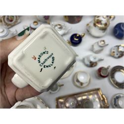 Collection of 19th century and later cabinet miniatures and small teapots and tea sets, to include examples by Coalport, Spode, Masons, Portmeirion etc 