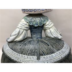 Large Lladro figure, La Menina, modelled as a maid of honor in service, on a mahogany oval base, limited edition 99/1000, sculpted by Jose Puche, with certificate of authenticity, framed and glazed, no 1812, year issued 1996, year retired 2019, H60cm