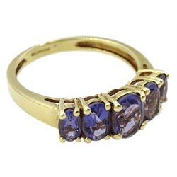 9ct gold five stone graduating oval tanzanite ring, hallmarked 