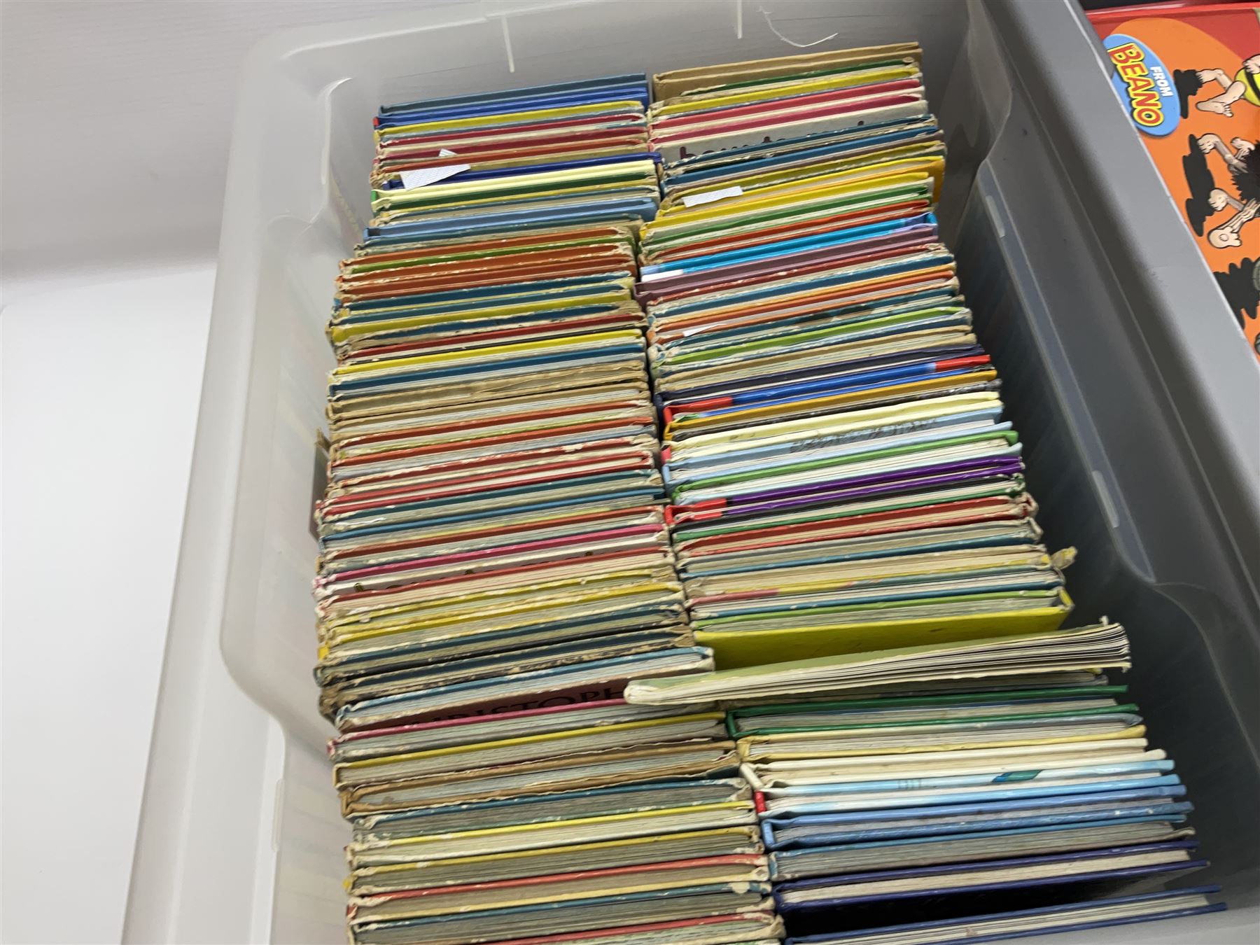 Children's annuals, books and booklets, including Scorcher Annual 1975, Valiant Annual 1977,  Beano Annual 2004, 2005 etc, The Big Enid Blyton Book, various Woman's Weekly magazines, Spot's Magical Christmas by Eric Hill and other similar hardback children's books etc, in four boxes 