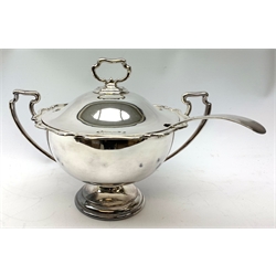  A selection of silver plate, comprising two large pedestal tureen and covers with ladles, two twin handled vegetable servers, a pair of twin handled serving dishes and covers, a further serving dish and cover.   
