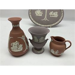 Collection of Wedgwood Jasperware, in orange, lilac and pink colourways, including oval tray, small jug, trinket boxes, trinket dishes, etc , all with impressed mark beneath