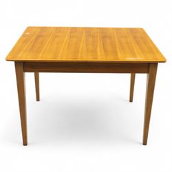 Gordon Russell - mid 20th century teak dining suite, comprising rectangular extending dining table and six matching chairs including one carver, each chair with padded upholstered seat and backrest in vinyl, on square supports, the table with plain top and rounded edges on tapered legs, an example of the firm’s functional post-war design with restrained modernist detailing (Chairs H 85cm, W 47cm, D 46cm) (Extends to 154cm)