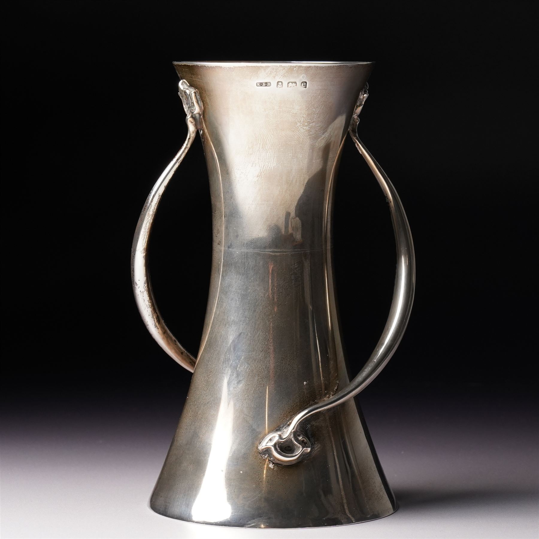 Early 20th century Art Nouveau silver vase of waisted form with trailing handles H15cm Birmingham 1904 Maker  Edward Souter Barnsley retailed by Finnigans