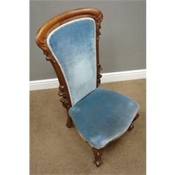  Victorian rosewood framed nursing chair, acanthus carved cresting and uprights, cabriole supports, upholstered in blue, H93cm   