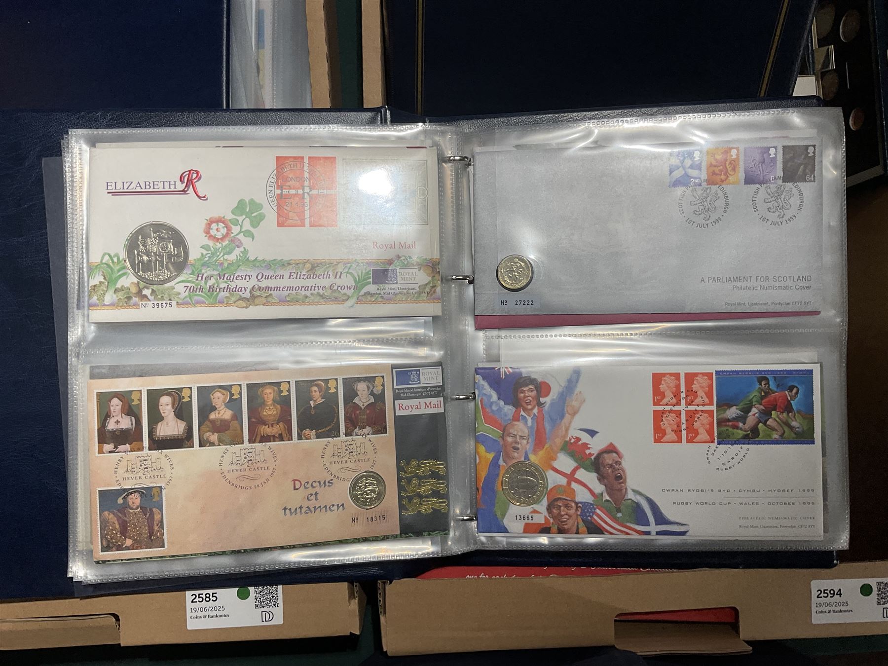 Approximately one hundred and fifteen Royal Mint coin covers, in two ring binder folders and loose, together with approximately 53 grams of Great British pre-1920 and approximately 68 grams of Great British pre-1947 silver threepence coins, and a small quantity of further pre-decimal coins