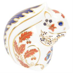 Four Royal Crown Derby paperweights, comprising Puffin, Squirrel, Badger, and Tiger Cub, each with silver stoppers