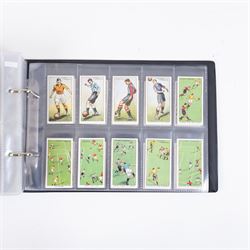 Collection of Edwardian and later Football related trading and cigarette cards, including forty-nine of fifty 1906 Ogden's Football Club Colours, 1922 PALS Footall series, ninety of one hundred 1925 Gallaher Famous Footballers, complete set of forty-four 1926 Ogden's Captains of Association Football Clubs and Colours, complete set of fifty 1927 Players Football Caricatures by MAC,  complete set of fifty 1927 Players Football Caricatures by RIP,  complete set of fifty 1930 Players Association Cup Winners, complete set of 50 1933 Ogdens AFC Nicknames etc, housed in brown cigarette card album