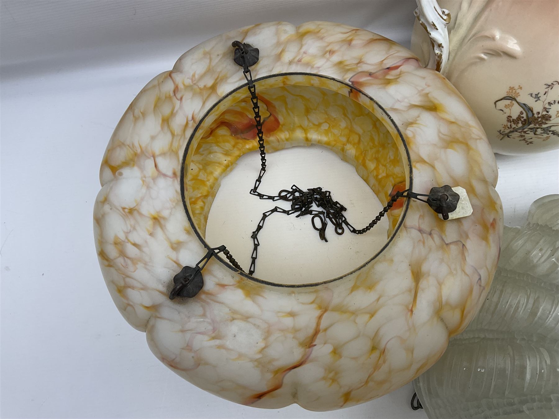Two Art Deco mottled glass fly catcher ceiling light shades, together with two other 1930s moulded glass ceiling light shades and two Victorian style wash jugs, largest shade D33cm