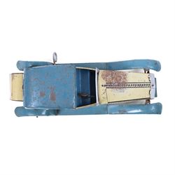 Wells tinplate clockwork limousine, the cream body, with blue roof and lithographed details, with driver and key, H8cm, L23cm