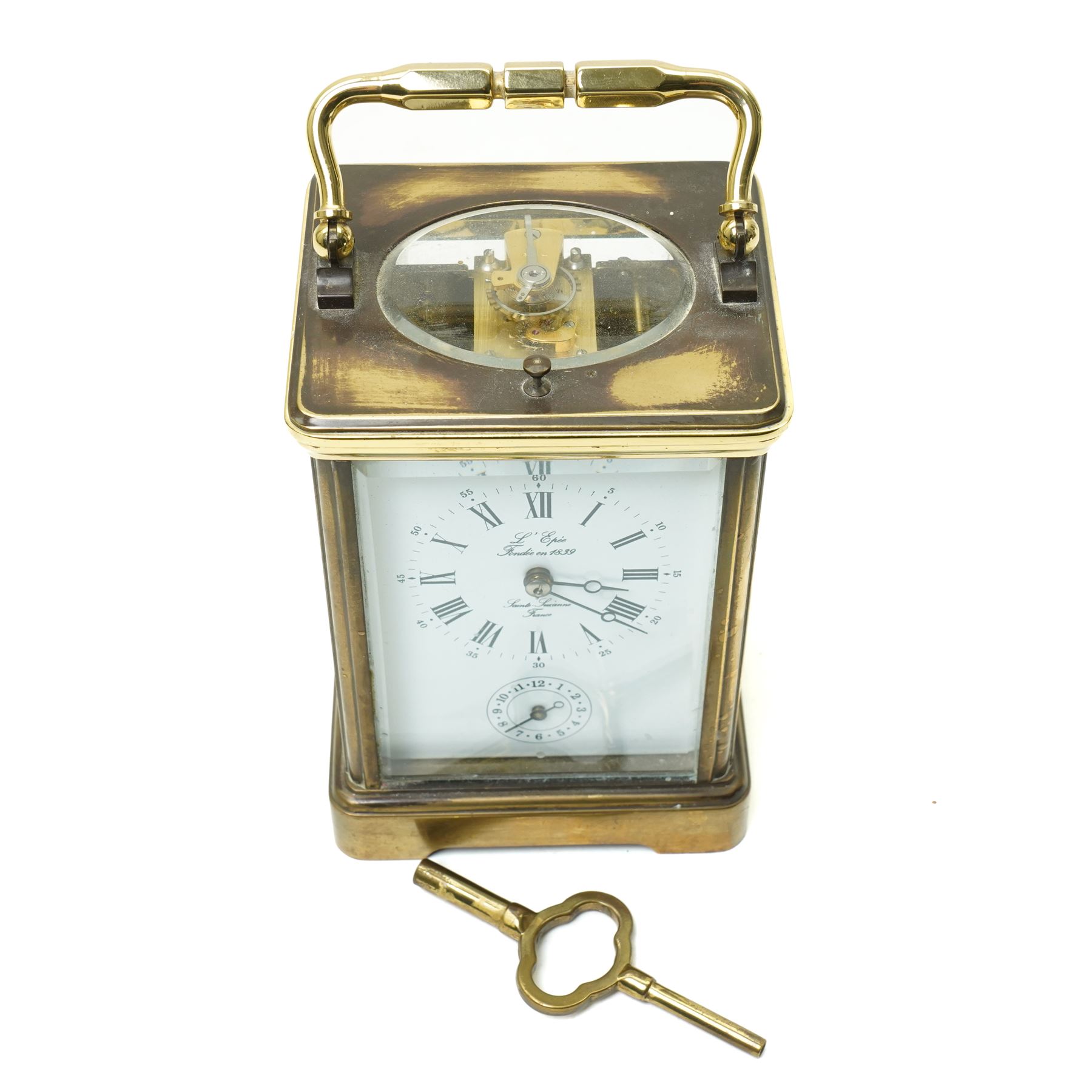 French carriage clock, the white dial inscribed 'L'Epee Fondee en 1839, Sainte Suranne, France,  with repeater movement and alarm in brass and bevelled glass case H13cm