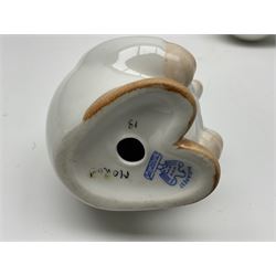 Group of eleven Aquincum of Budapest figures, comprising two of a man in a feather hat, seven dwarves, man and woman in traditional dress, all with printed marks beneath