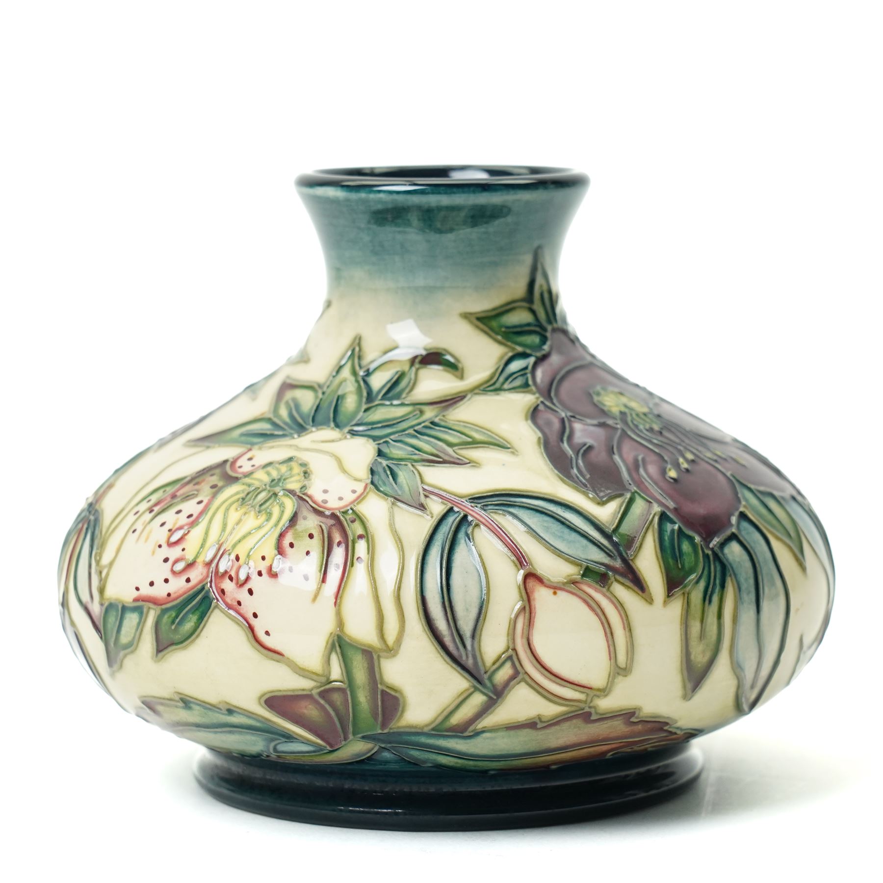 Moorcroft Hellebore pattern vase, of squat baluster form, with impressed and painted marks to base, in original box, H10.5cm 