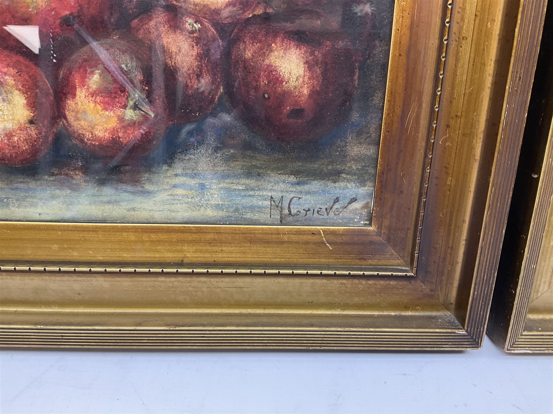 M Grieve (British 20th century): Still Life of Apples and Still Life of Mixed Fruit, pair pastel and watercolours signed 30cm x 45cm (2)