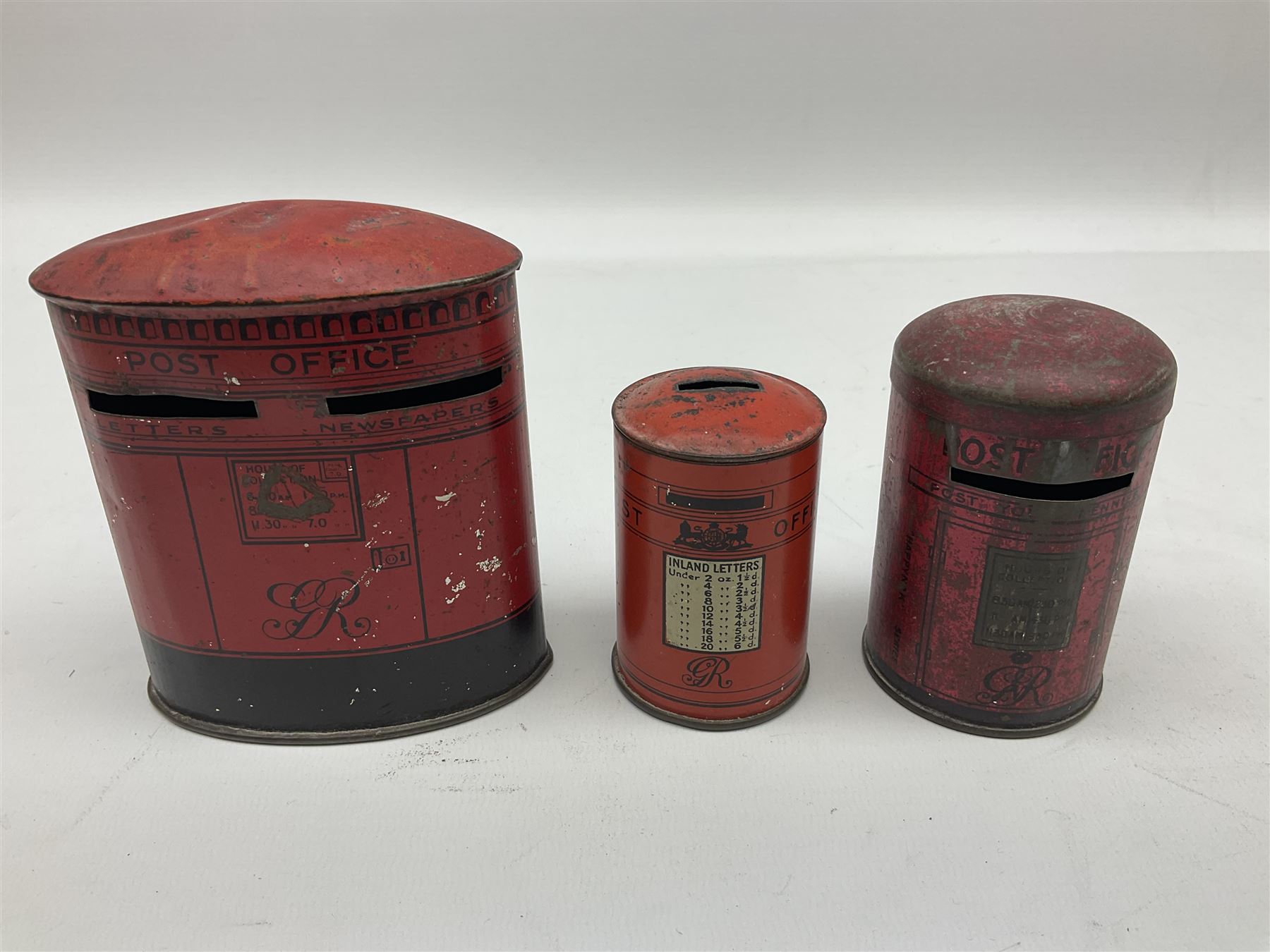 Collection of tin plate money boxes in the form of Royal Mail post boxes, to include four Chad Valley examples, one with key and others similar,  marked VR, GR and ER (10)