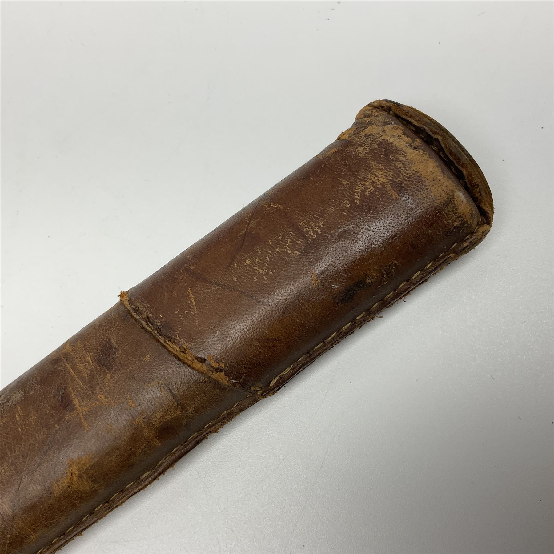 WW2 Japanese Army officer's shin gunto/katana sword with 67cm steel single edged blade, foliate cast brass tsuba, bound fish-skin grip with brass mounts, inscribed and painted marks to tang; in lacquered wooden scabbard with leather combat covering bearing four character marks L99cm overall