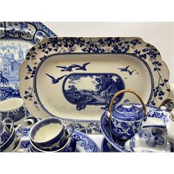 Collection of 19th century and later, blue and white transfer printed wares, including four meat platters with various patterns, Spode saucers in Italian pattern, with blue printed mark beneath, collection of dinnerware in willow pattern, etc.   