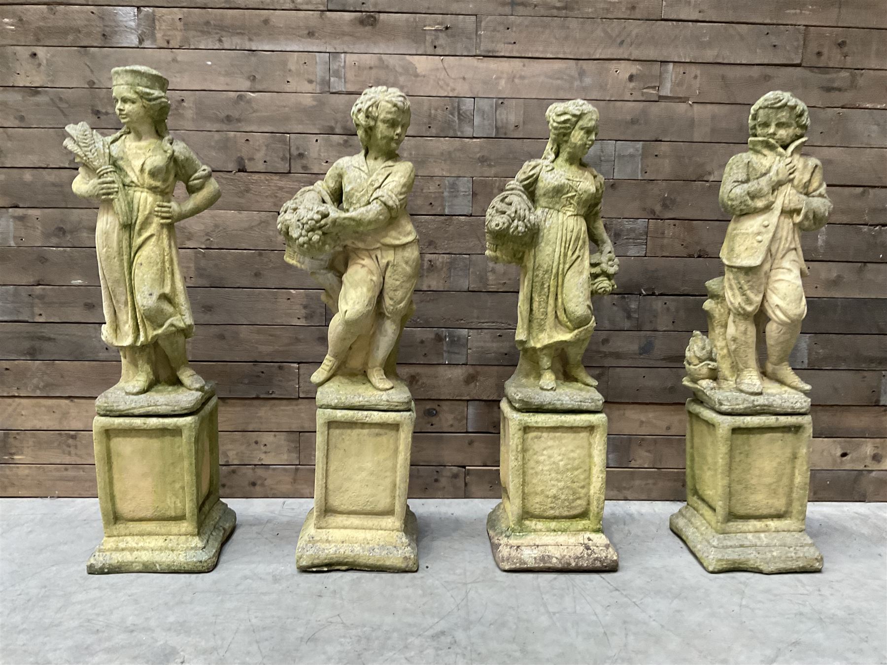 The Four Seasons - set of four cast stone garden figures on plinths