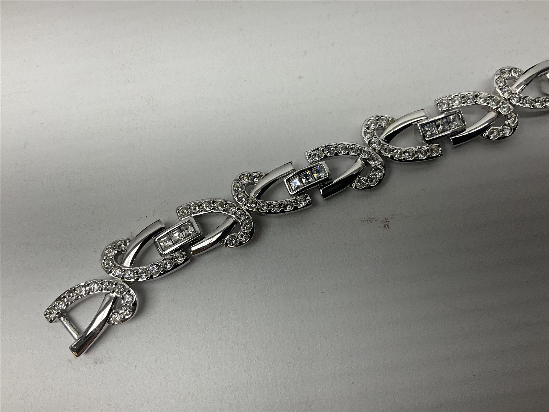 Maurice Lacroix gentlemans quartz wristwatch, 92127, with gold plated case, date apeture and leather strap, together with a Swarovski Crystal bracelet, two silver brooches and two costume brooches