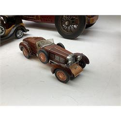 Four Franklin Mint Precision Models, one with hardwood body; large reproduction model of a vintage racing car L52cm; and four other modern metal/wooden models of vintage cars; all unboxed (9)