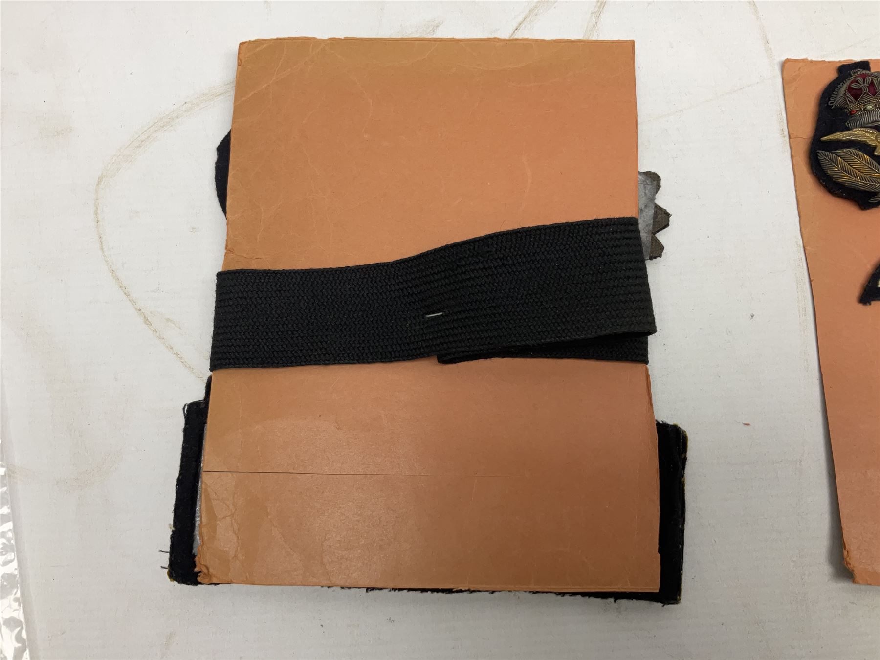 Quantity of WW1 and later Royal Navy and RAF cloth and metal badges and insignia