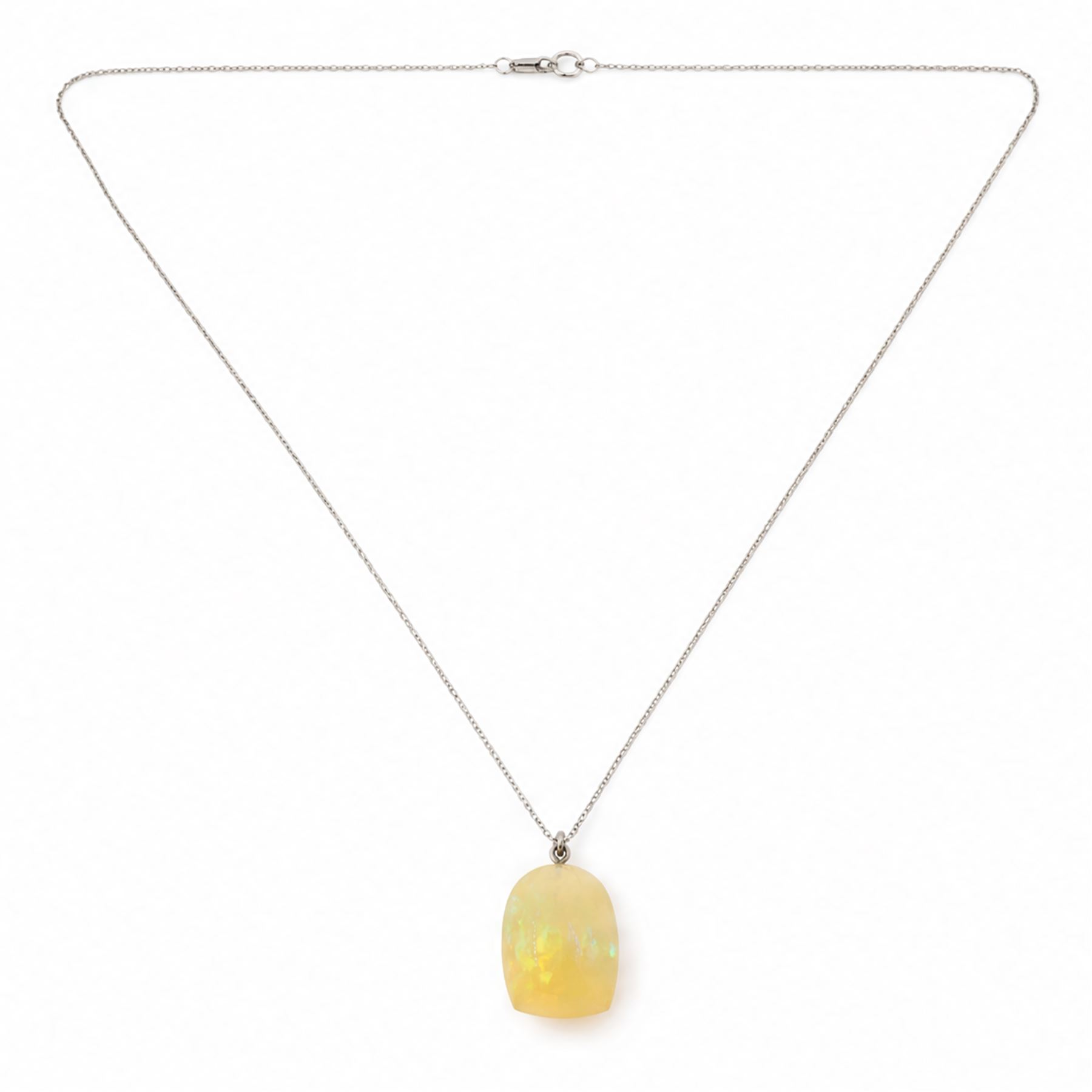 18ct opal pendant necklace, single vari-cut opal of approx 15.00 carat, on a fine trace link chain necklace, stamped 750