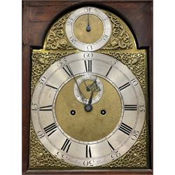 Henry Hindley of York – mid-18th century oak cased 8-day longcase clock,
flat topped caddy pediment with gesso finials, rectangular hood door flanked by wooden turned pilasters with capitals, canted trunk with a full-length break arch topped door on a short plinth with applied skirting and bracket feet, brass dial with a silvered chapter ring, Roman numerals and five-minute Arabic’s, minute and inner quarter hour tracks, matted dial centre with subsidiary seconds dial, blued steel hands and female head pattern spandrels, silvered calendar dial to the break arch with dolphin spandrels, four pillar rack striking movement, striking the hours on a bell. With weights and pendulum. 
H250 W48 D27
Henry Hindley originally from Wigan (Lancs) is recorded as working in York from Petergate 1731-41 then Stonegate 1741-1771. A famous and highly innovative maker, often referred to as the “Tompion of the North.” 
