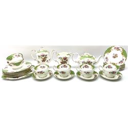 Paragon Rockingham pattern tea set, comprising teapot, coffee pot, four teacups and four saucers, six side plates, six dessert plates, cake plate, two open sucriers, and jug. 