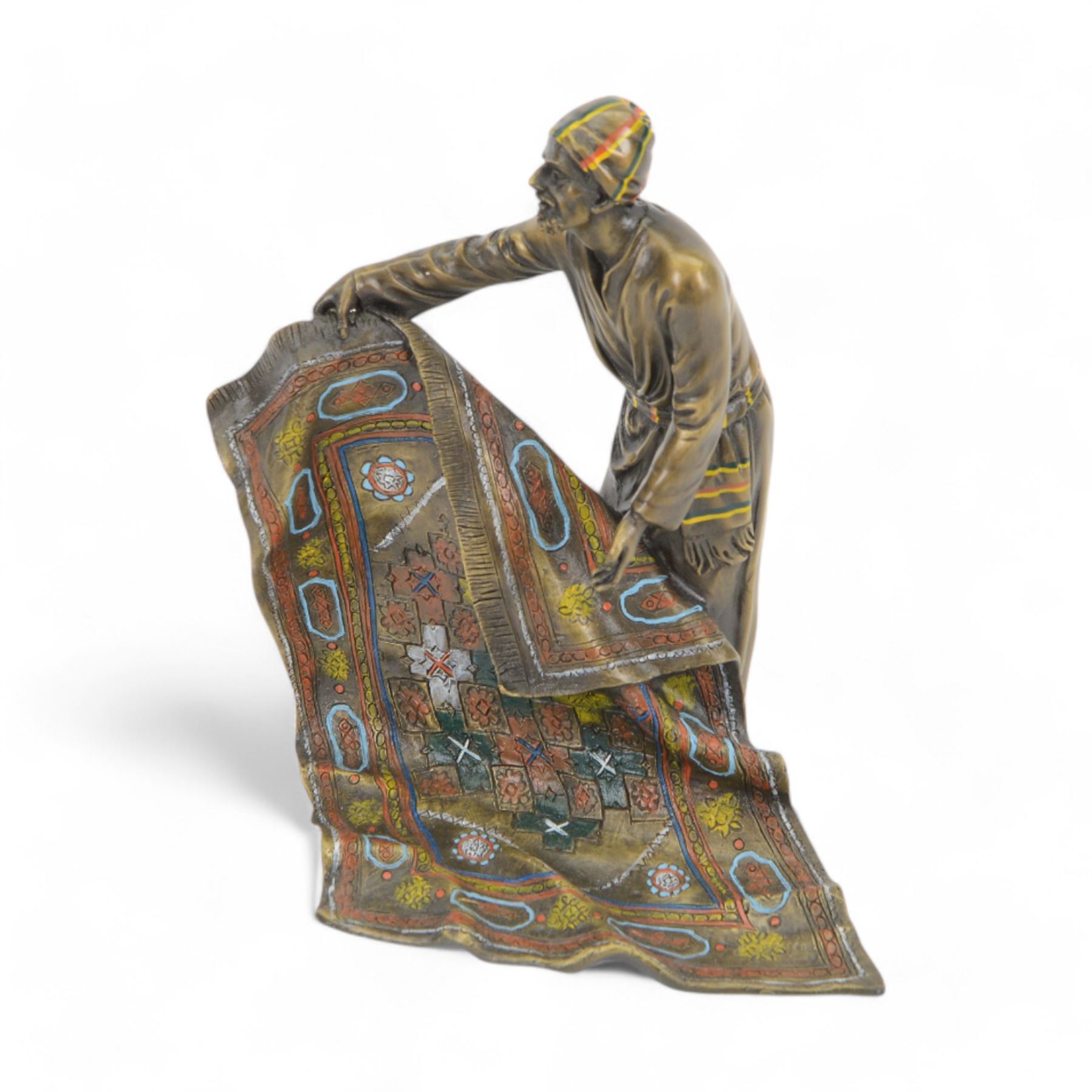 After Franz Bergmann bronzed sculpture of a carpet seller, with colourful painted highlights throughout, H19cm