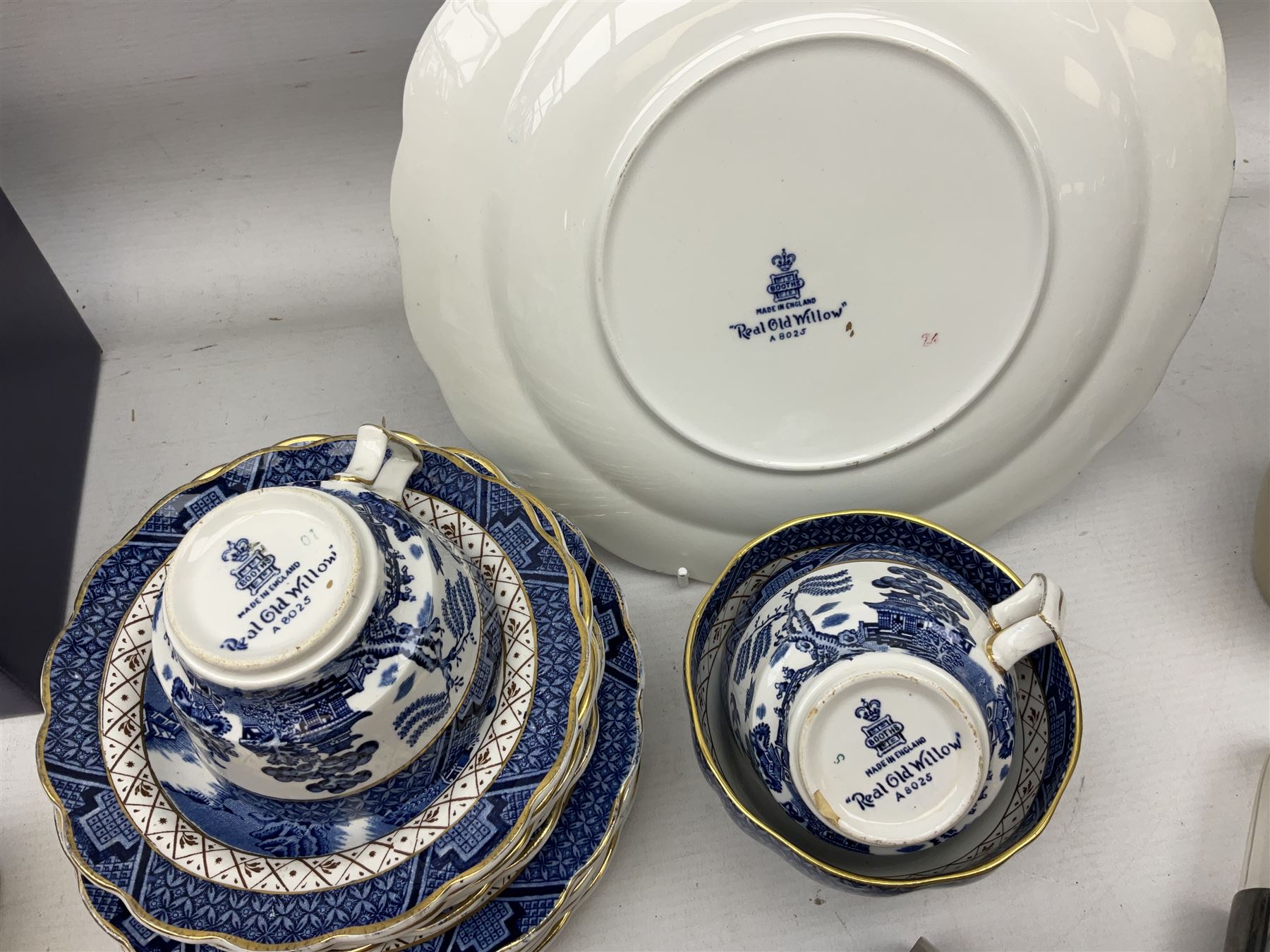 Booths Old Willow pattern plates, teacups and saucers, together with Stuart Crystal bowl with frog lid, small barometer and other collectables