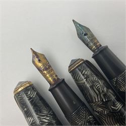 Conway Stewart Executive 60 fountain pen, the barrel and cap with hatched grey and black marble decoration and gold nib stamped Duro 14ct, together with a Conway Stewart 58 fountain pen similarly decorated in pearl blue and black with gold nib stamped 14ct, largest 13cm (2)