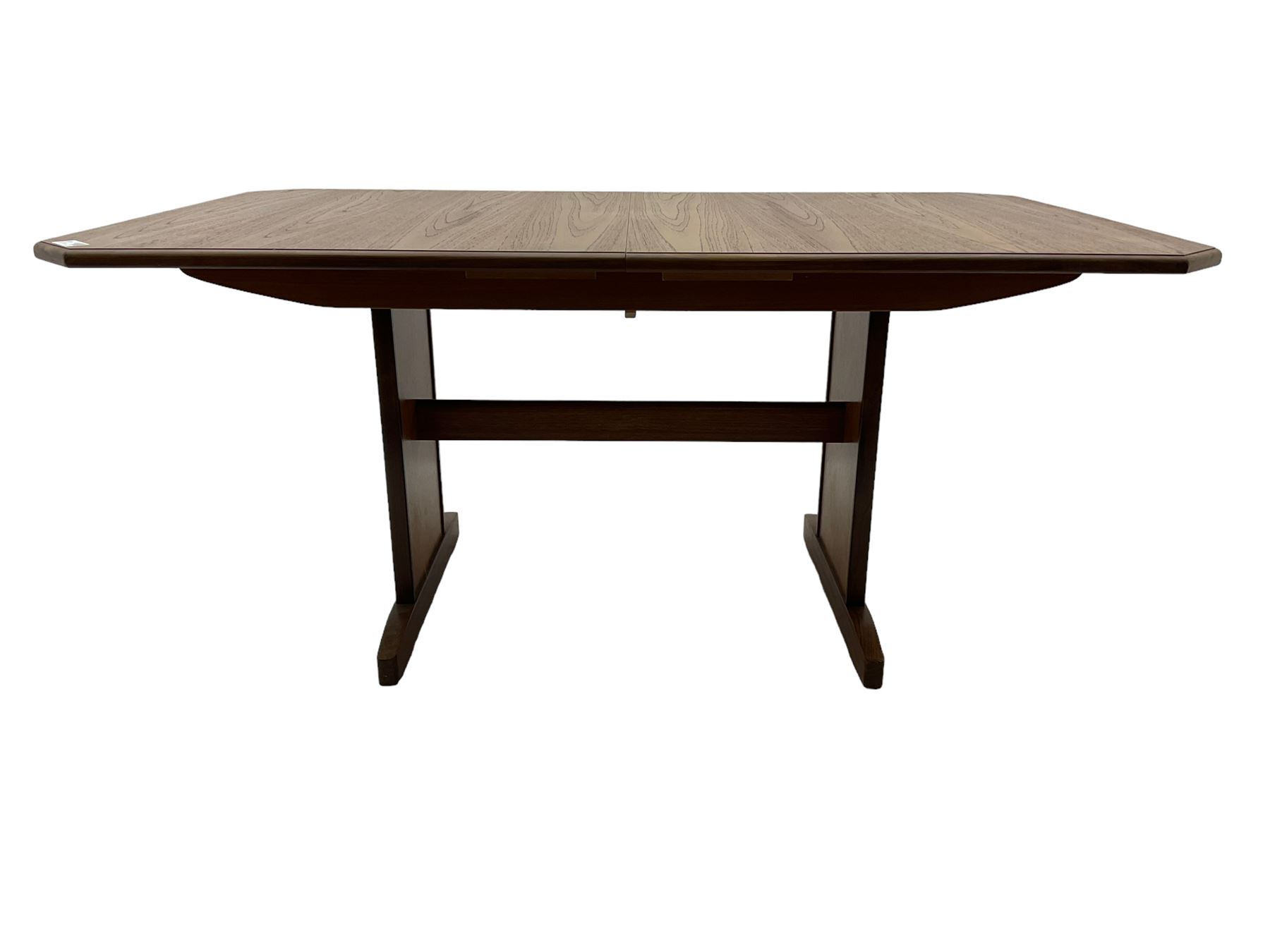 G-Plan -  1970s teak extending dining table, pull-out extending action with fold-out leaf, rectangular end supports on sledge feet united by stretcher (100cm x 160cm - 205cm, H73cm); set of six dining chairs, chevron-patterned backrests upholstered with floral patterned fabric, on tapered legs, H89cm
